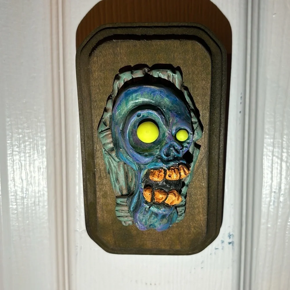 Handmade Coffin Zombie Head wall decor with glow in the dark eyes